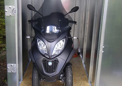 Piaggio MP3 ArmadilloBoxes secure motorcycle shed