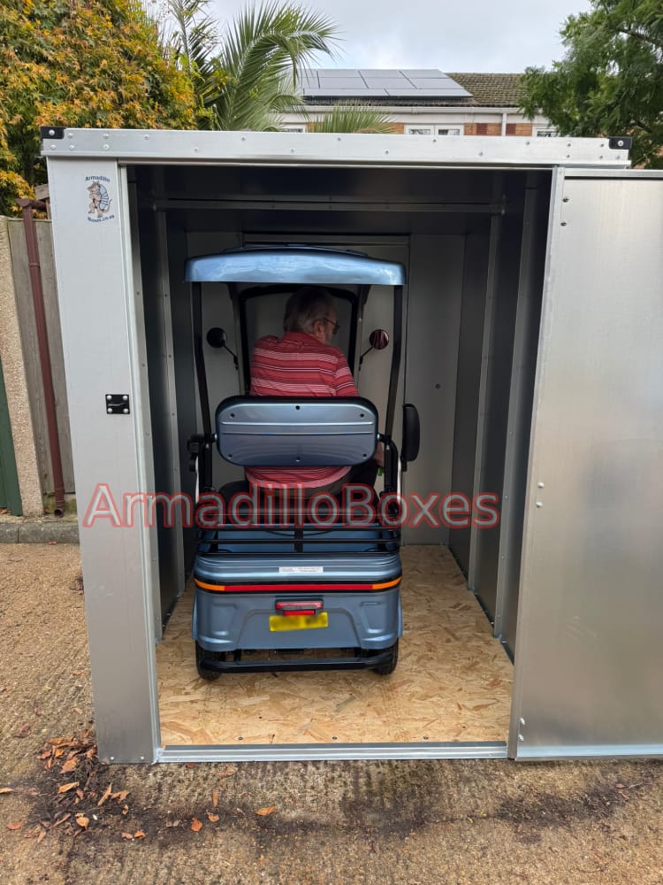 Mobility scooter storage with LuXe X1000 Cargo mobility scooter inside door open