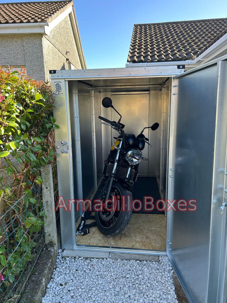 Kawasaki z650 in a ArmadilloBoxes 1100mm wide secure motorcycle shed