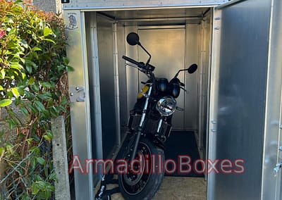 Kawasaki z650 in a ArmadilloBoxes 1100mm wide secure motorcycle shed